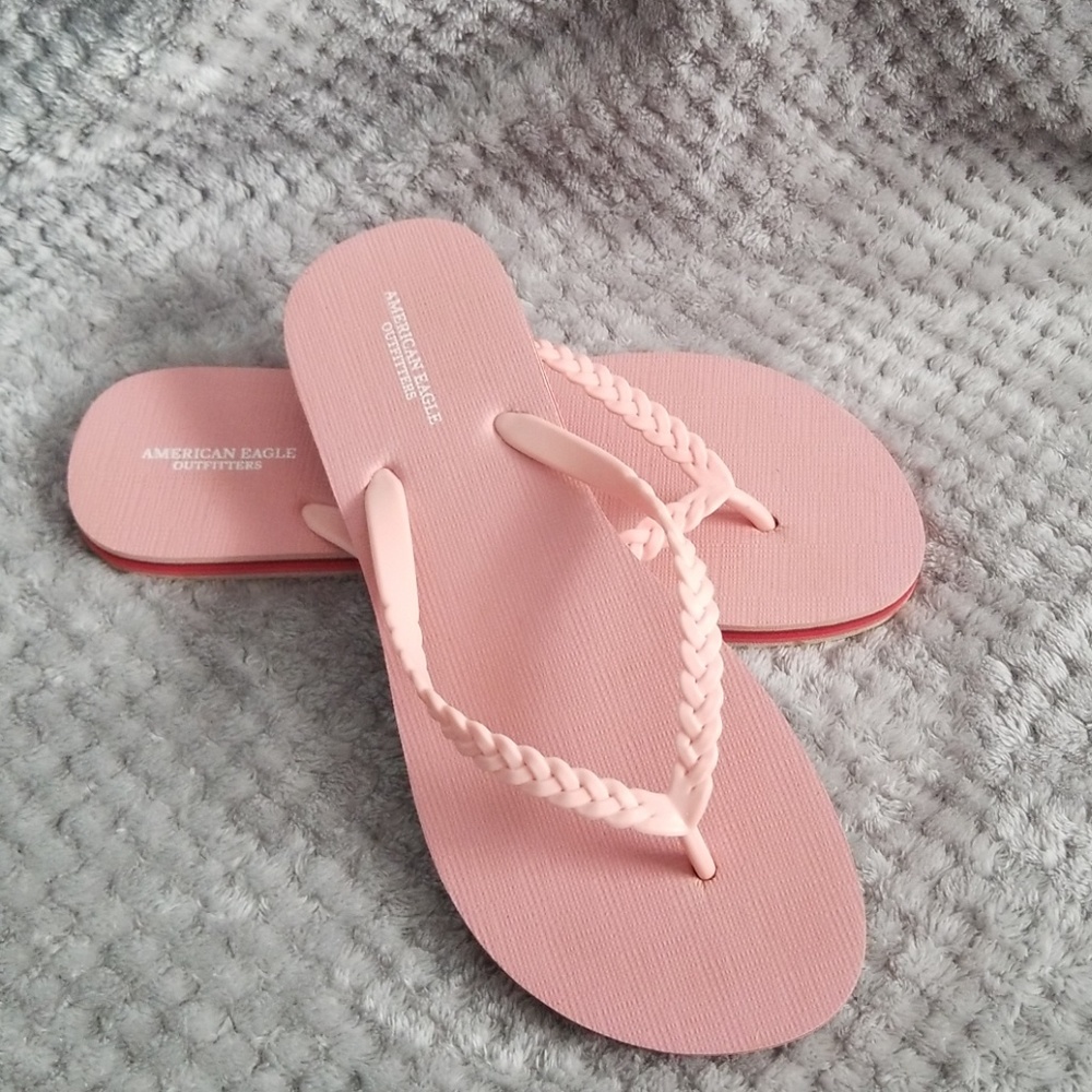 Women's pink American Eagle braided flip flops